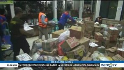 Relawan Distribusikan Bantuan untuk Korban Banjir Madiun