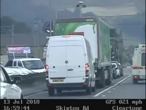 North Yorkshire Police release footage of driver smashing through railway barriers and almost colliding with train
