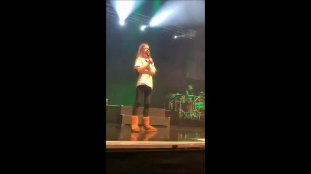 Schoolgirl performs on stage with Jessie J