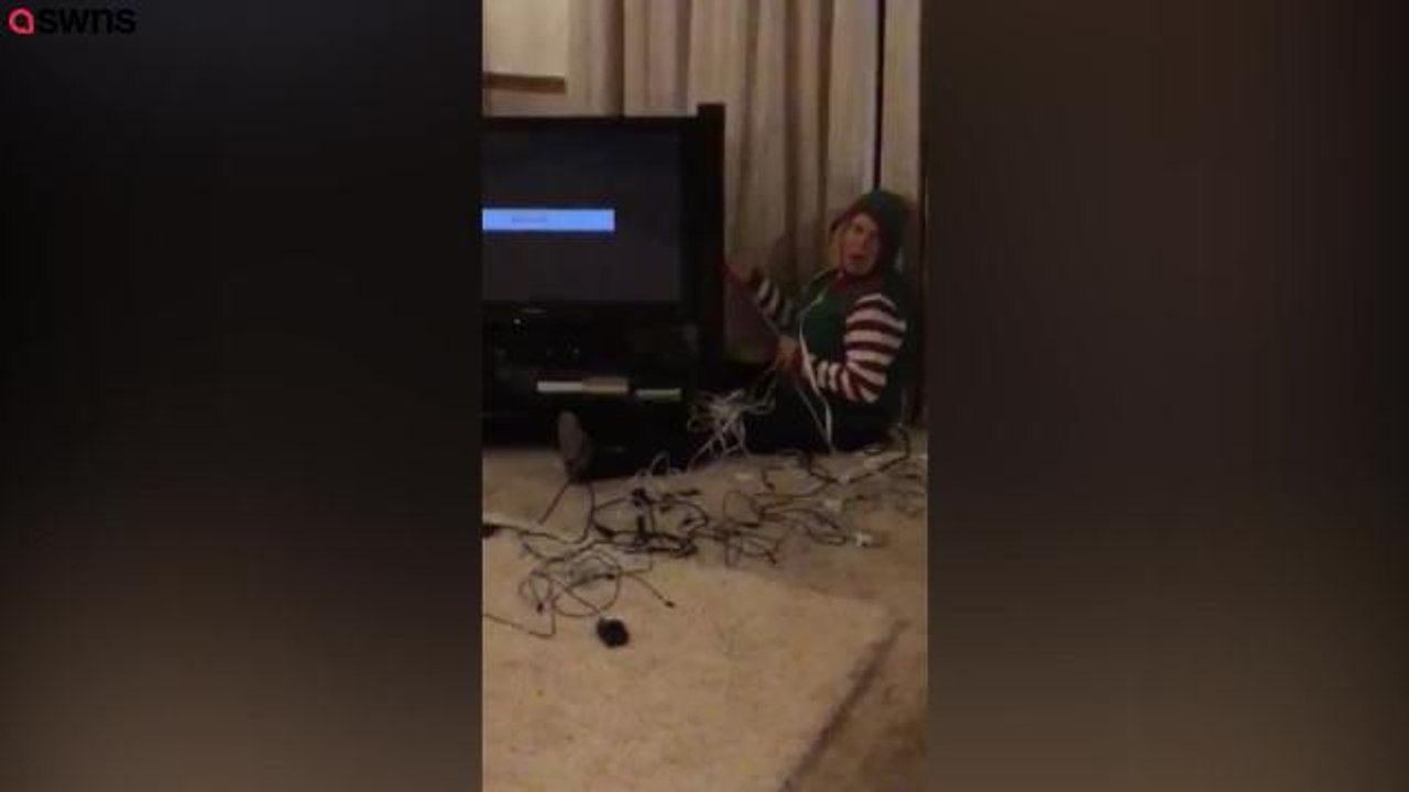 SWNS_171218_Gran does her own bonkers version of elf on a shelf where she dresses up as santa's helper for mischievous videos