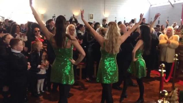 Irish dancers perfom at the funeral of Francie Doherty Sr