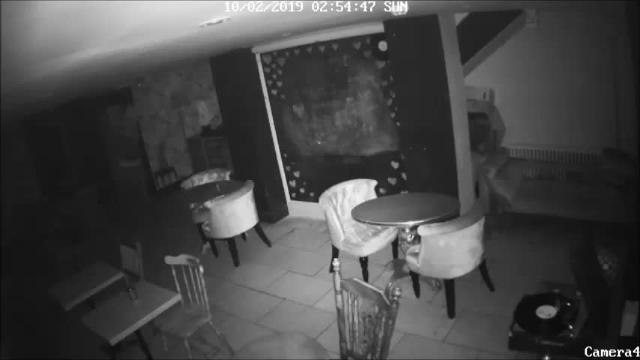 CCTV footage of the 'stripey-topped burglar' in Dapper Sandwich on January 11.