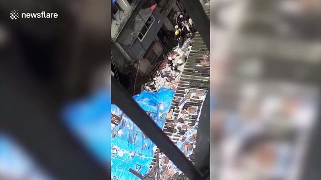 At least four dead and dozens still trapped in Mumbai building collapse