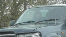 SWNS - Video of frightening moment animal activists were repeatedly RAMMED by a 4x4 while driving to a hunt