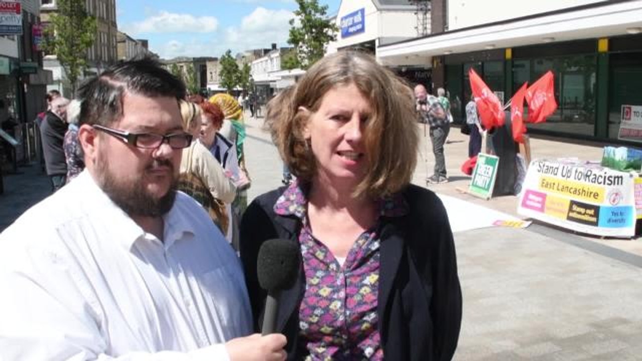 Demonstrators gather for peaceful protest against far right activist Tommy Robinson's visit to Burnley