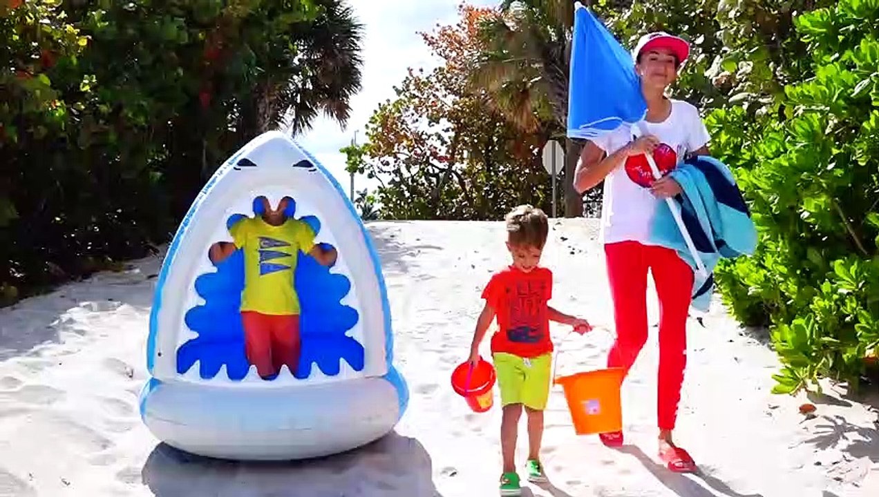 Vlad and Mommy take a rest on the sand