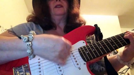 Me singing and playing guitar