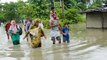 Assam Floods: Danger Mark से ऊपर बह रही है Brahmaputra River, Red Alert जारी । वनइंडिया हिंदी
