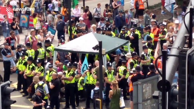 Police move in on Extinction Rebellion protesters blocking Bristol road