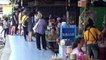 Locals eat at tables just inches from passing trains at Thai restaurant