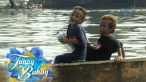 Tunay na Buhay: Limang taong gulang na bata, lumalangoy sa Manila Bay para mangalakal