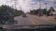 Truck in Thailand tries to cut off other drivers but immediately flips over and crashes