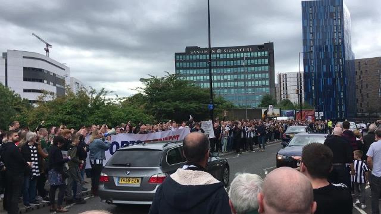 Newcastle fans protest against Mike Ashley outside the club shop