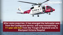 Helicopter hovering above Blackpool