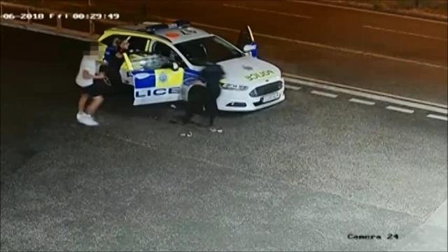 CCTV footage shows Smith attacking a female police offcer as he fled the scene of the robbery