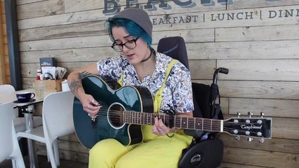 Woman singing to her dog