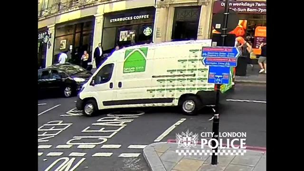 Startling CCTV footage has been released of a "horrified" pedestrian being shoved in front of a taxi after brushing shoulders with another man