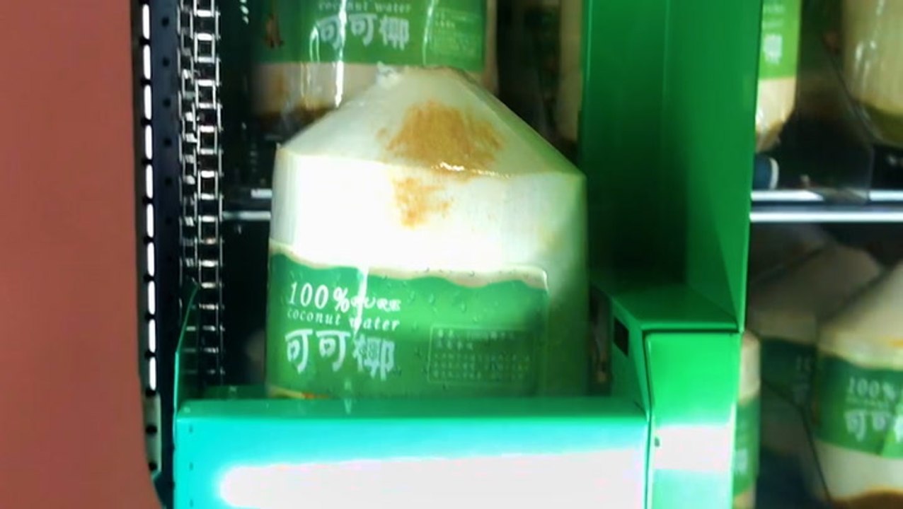 This vending machine dispenses fresh coconuts