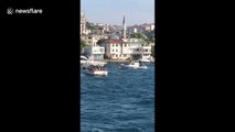 A yacht in flames on the Bosphorus in Istanbul, Turkey