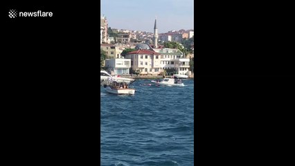 A yacht in flames on the Bosphorus in Istanbul, Turkey