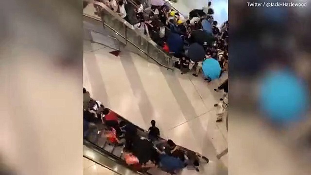 Shocking footage shows Triad members attacking protesters