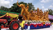 Beautiful giant wax sculptures mark Buddhist Lent in Thailand