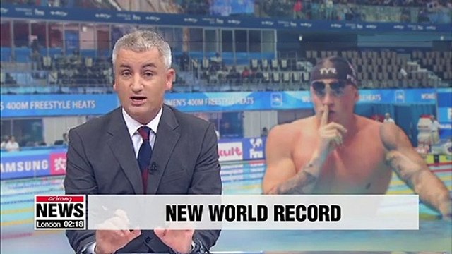 Adam Peaty of Britain breaks own world record in 100m breaststroke with time of 56.88 seconds