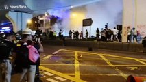 Chaotic scenes in Hong Kong as riot police fire tear gas at protesters