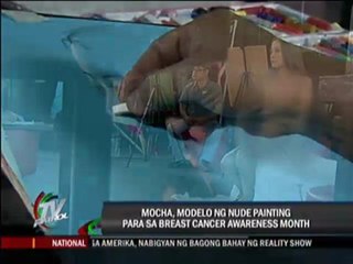 Mocha poses nude in breast cancer painting session