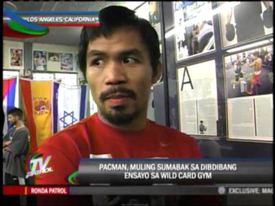 Pacman 'coaches' basketball team while on break