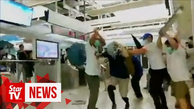 Reporter attacked while on-air by suspected triad gangsters in Hong Kong