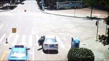 Heroic taxi driver chases down driverless car rolling down road in China and stops it