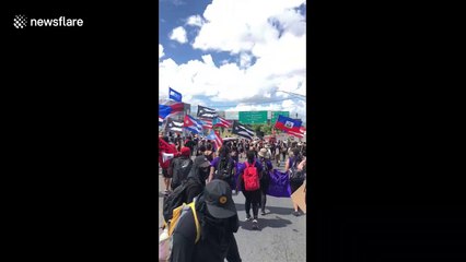 Puerto Rico's strike marches on major highway as pressure mounts on governor to resign