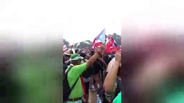 Heavy rain doesn't dampen the spirit of dancing Puerto Rican protestors demanding governor's resignation