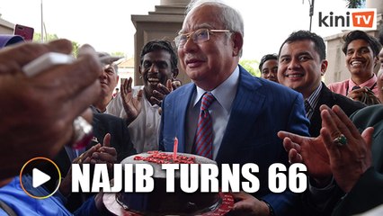 Najib turns 66, gets birthday surprise outside court