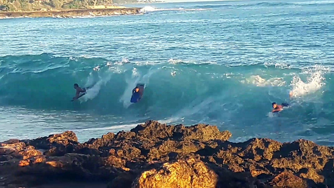 Wave Crushes Boy on Boogie Board