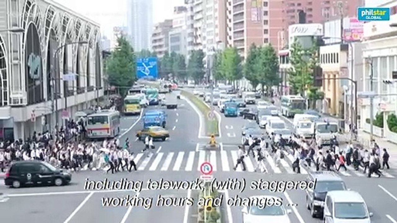 To avoid Olympic chaos, Tokyo tells workers: stay home