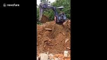 Big boy's toys! Vietnamese seven-year-old learns to drive excavator to help his father