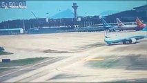 SUV almost collides with plane after driving across runway at Fuzhou's airport