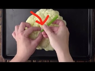 Er steckt eine Paprika in einen Blumenkohl. Wie genial!