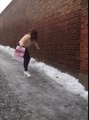 Girl Struggles to Walk in Heels on Ice
