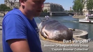 Life size whale sculpture on Paris' Seine River