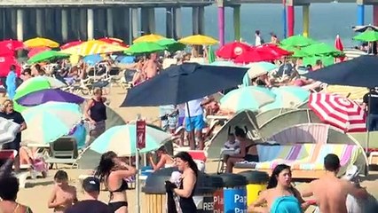 Water games and swimming as record-setting heatwave hits Europe