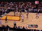 Dorell Wright takes an alley-oop pass from Dwyane Wade and f