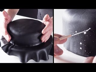 The Cake Will Be Covered In A Black Blanket And Painted