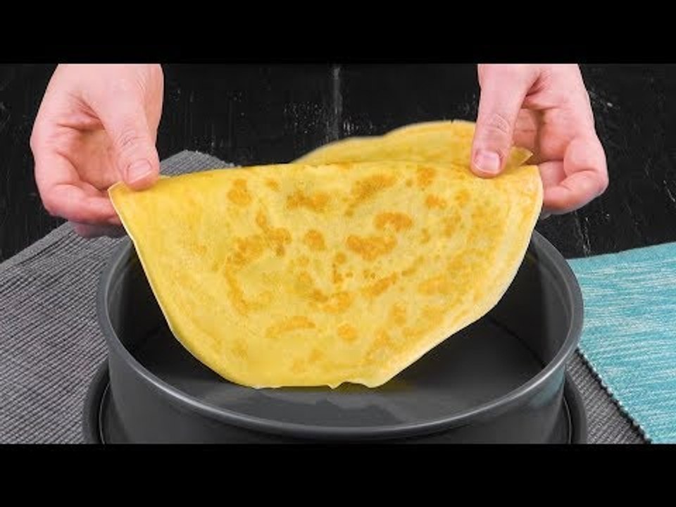 Lay The Crepes In The Cake Pan & Start Layering – How Delicious!