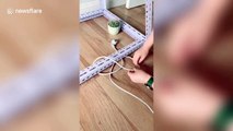 Incredible life hack! Chinese woman shows how to free plug cable trapped under table