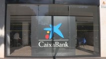 CaixaBank gana 622 millones hasta junio, 52 % menos, por los costes del ERE