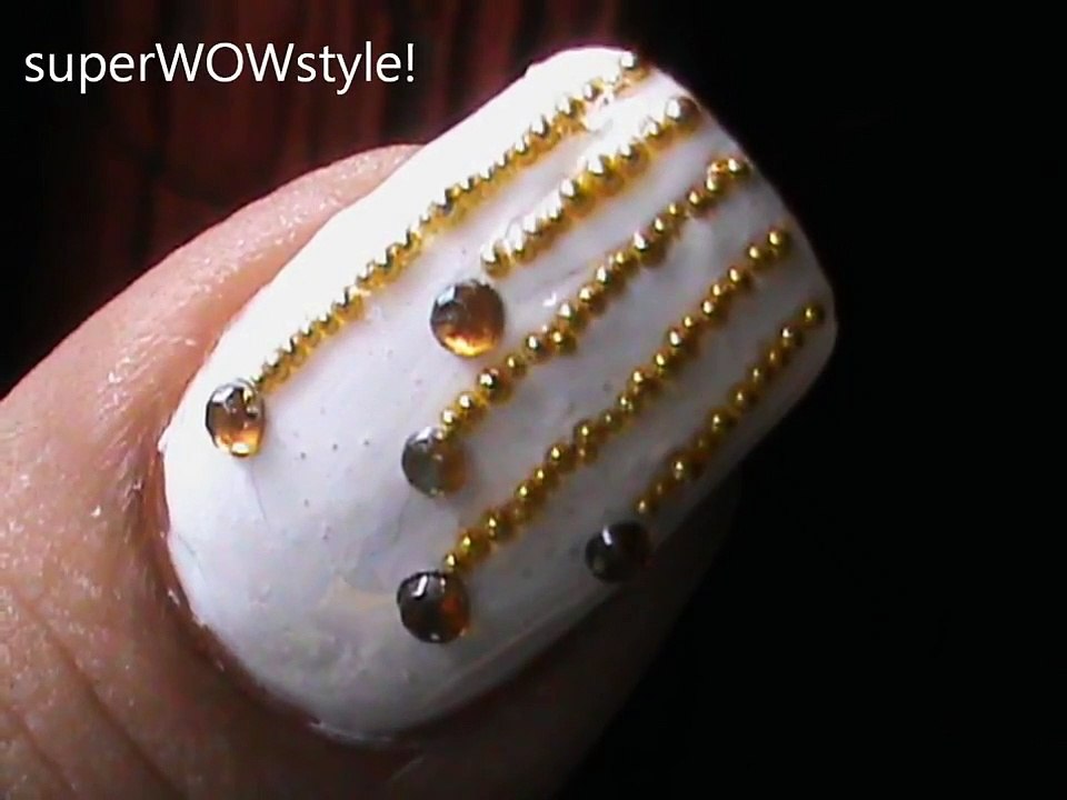 9. "Tiger Nail Art with Rhinestones on Dailymotion" - wide 3