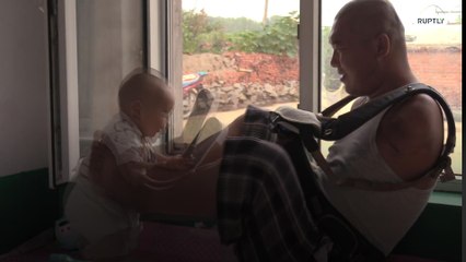 Amputee dad shares challenging experience of parenting with disability in China